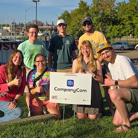 employees smiling and speaking