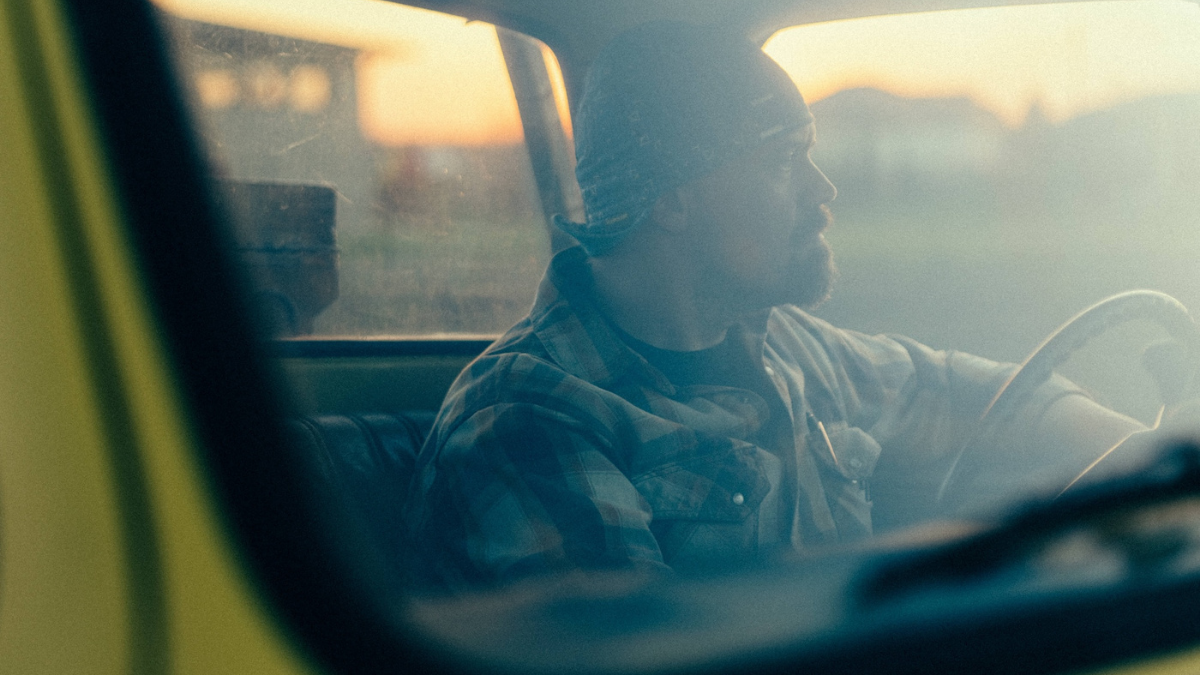 Contractor driving truck to job site.