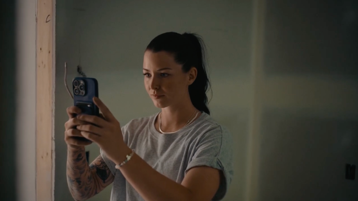 Contractor documents interior renovation progress using mobile app.