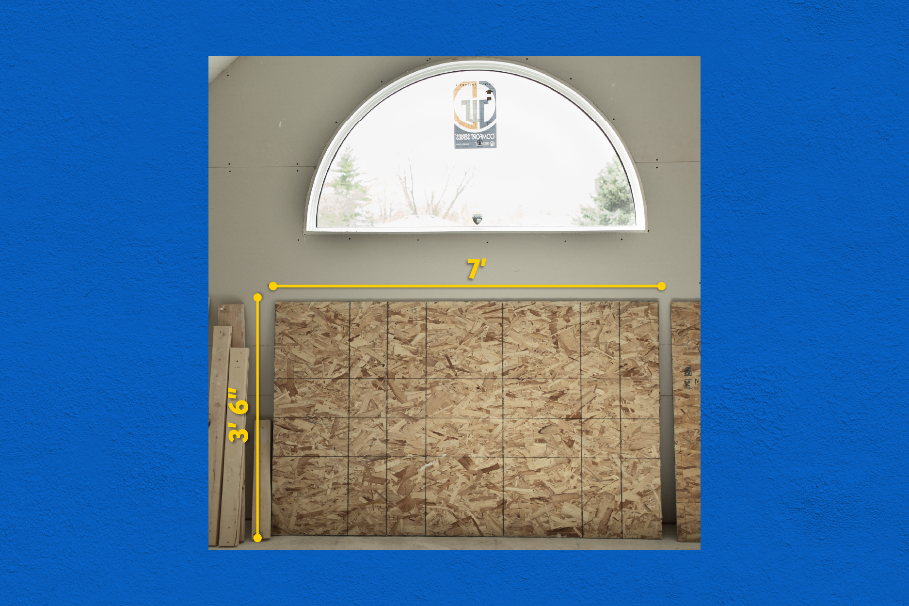 Framed plywood wall measured using CompanyCam LiDAR Mode, showing in-camera dimensions of 7 feet wide by 3 feet 6 inches tall for accurate material planning.