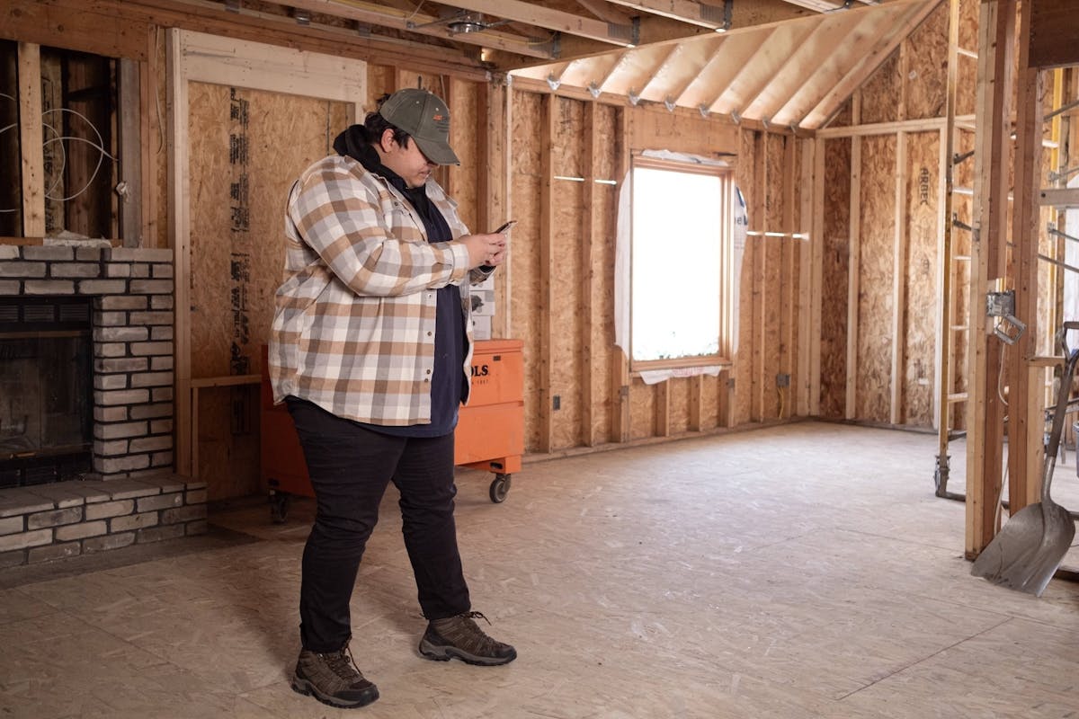 flooring contractor taking photo of project progress