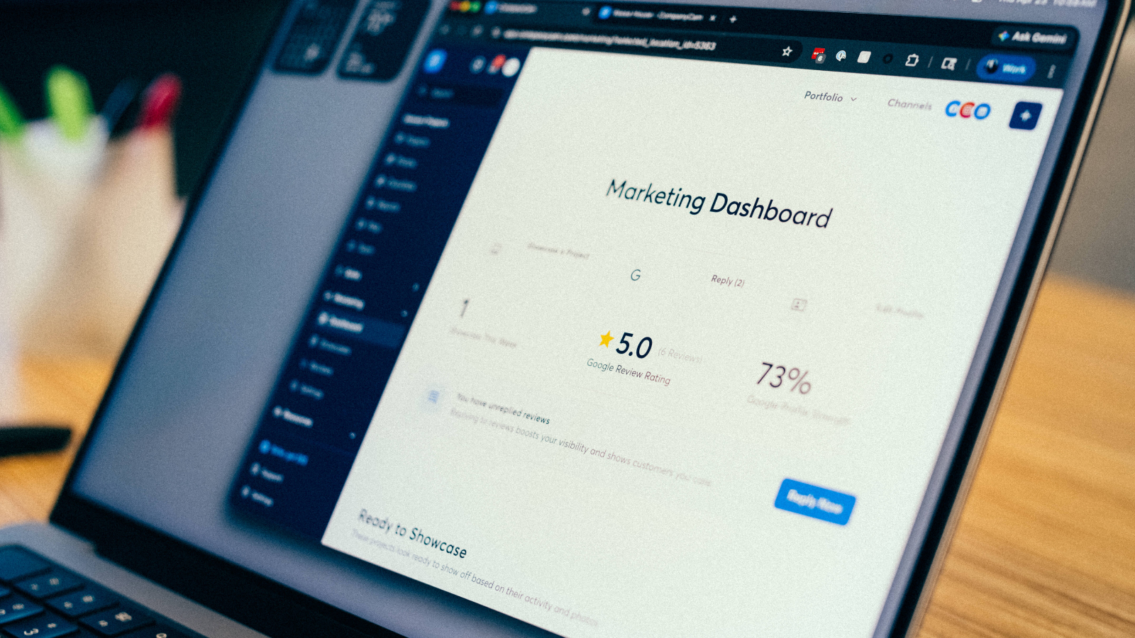 CompanyCam marketing dashboard on desktop displaying a contractor's 5.0 Google review rating and 73% Google profile strength.