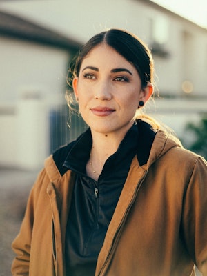 Person posing while doing work 1