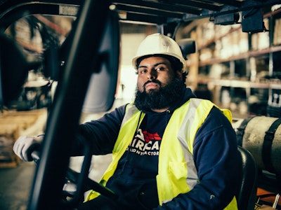 Person posing while doing work 4